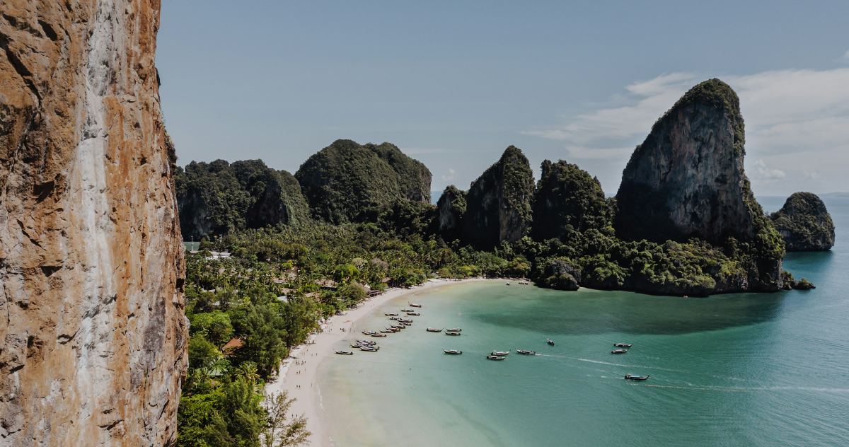 We'll kayak beneath the limestone cliffs of Railay and find a beach that only boats can reach.
