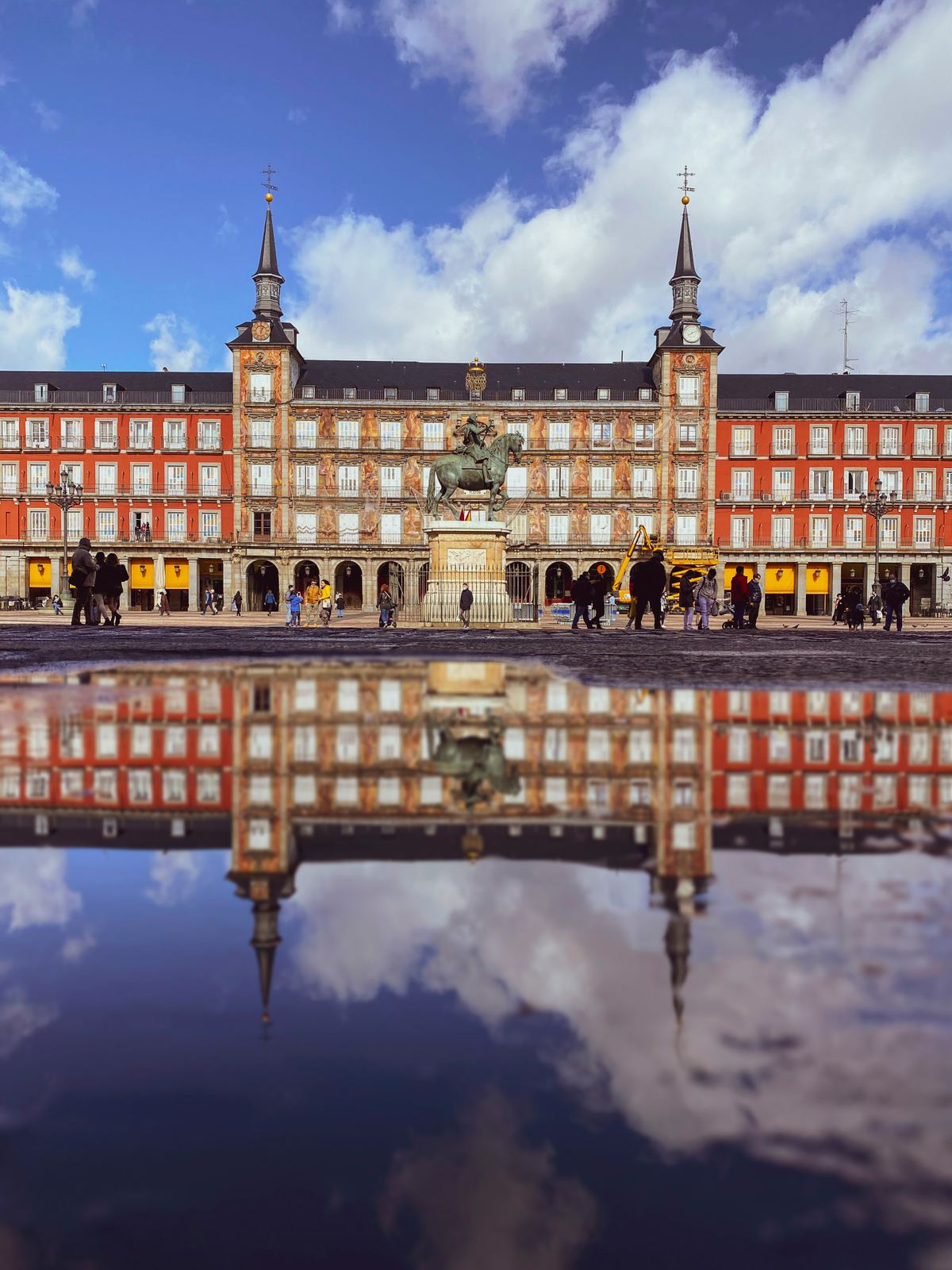 We'll walk through Plaza Mayor and the old streets of Madrid just after sunrise, then stop for churros and thick hot chocolate.
